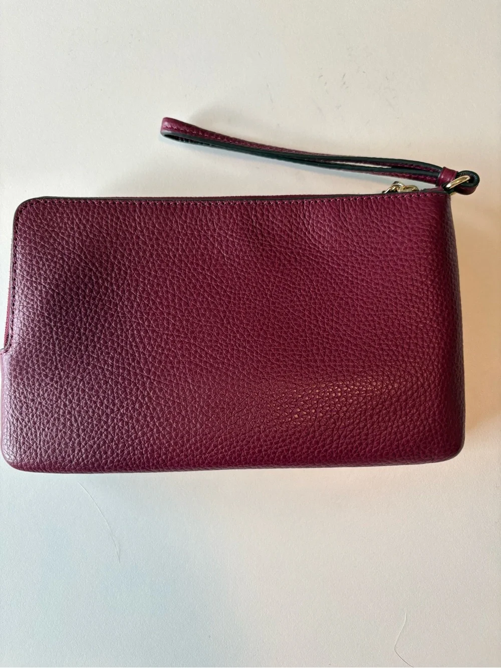 Coach corner zip